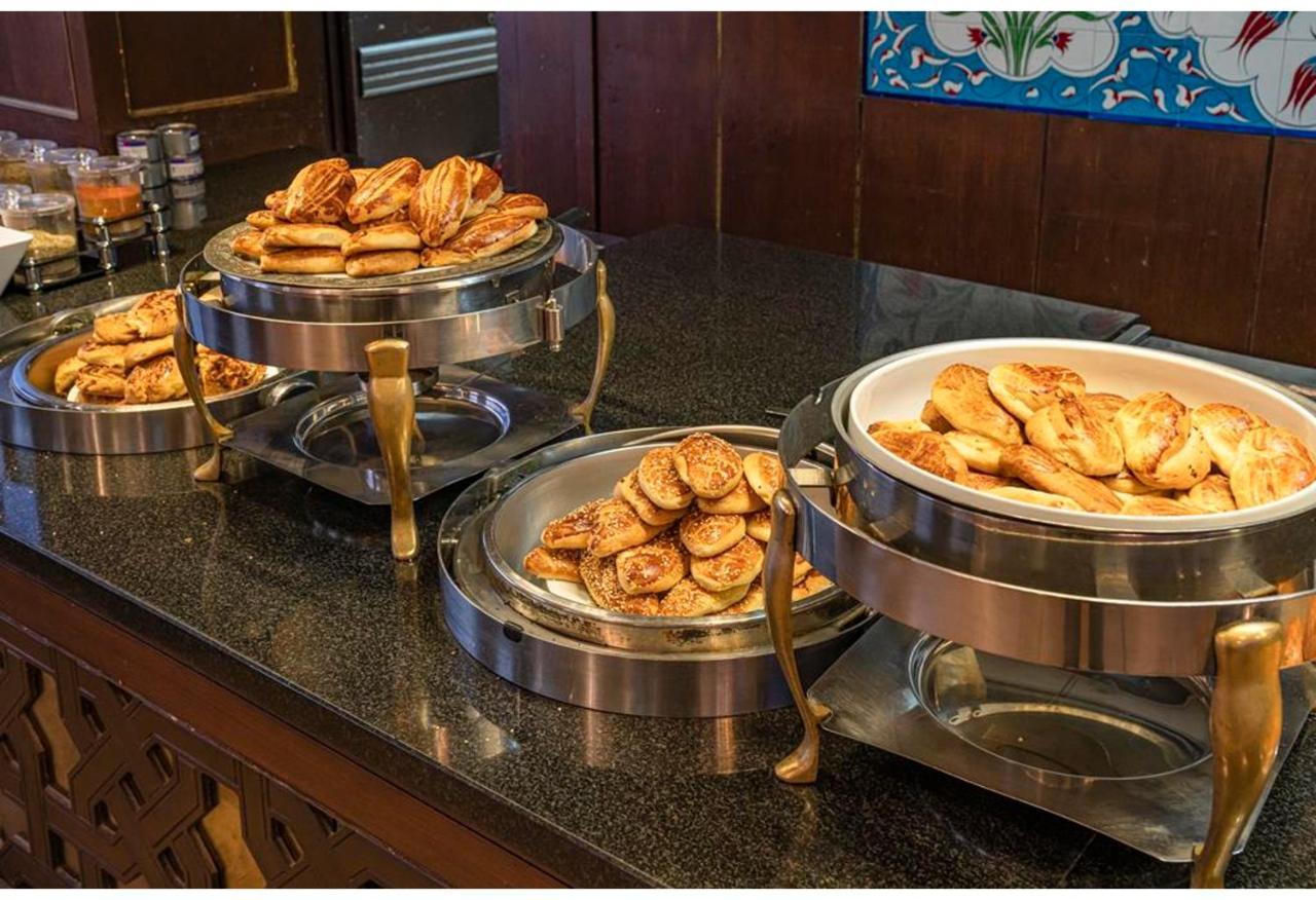 Savoy Hotel Spa & Casino Kyrenia  Exterior photo A selection of chaat at a buffet