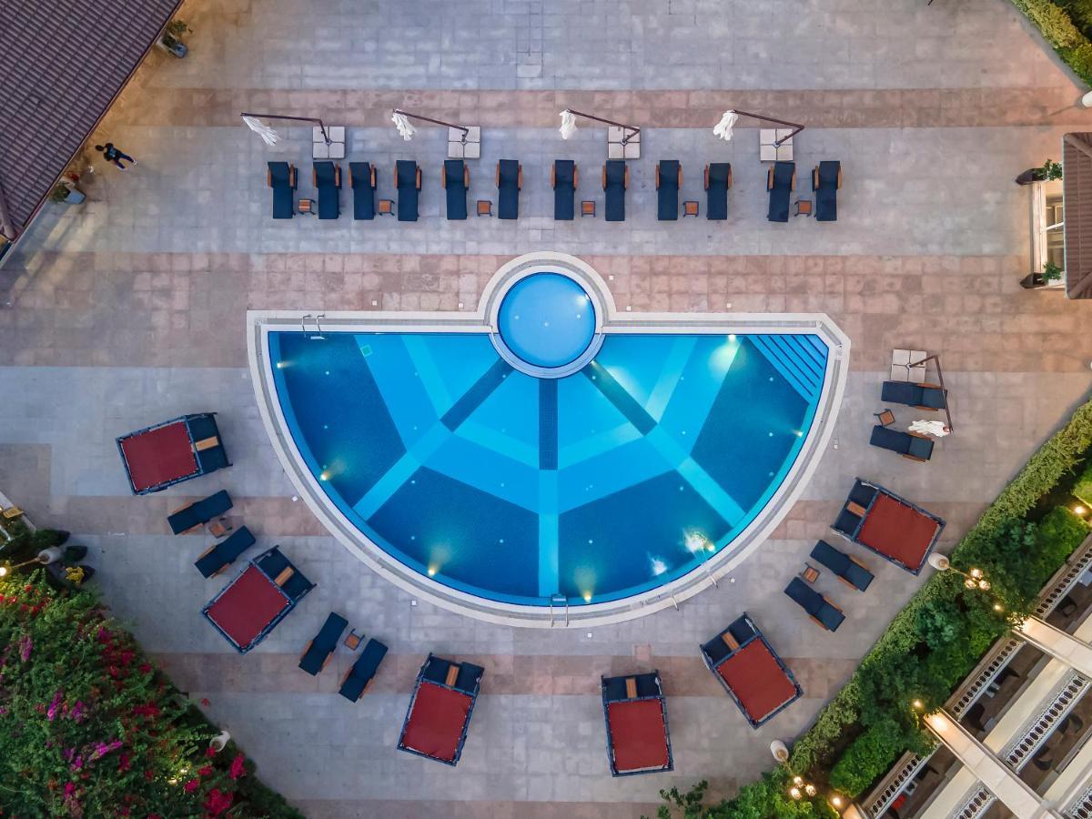 Savoy Hotel Spa & Casino Kyrenia  Exterior photo Aerial view of the pool at the hotel