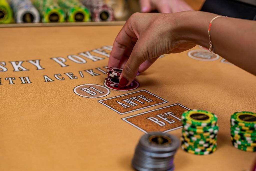 Savoy Hotel Spa & Casino Kyrenia  Exterior photo A player placing a bet on the "18" or "black" section of a roulette table